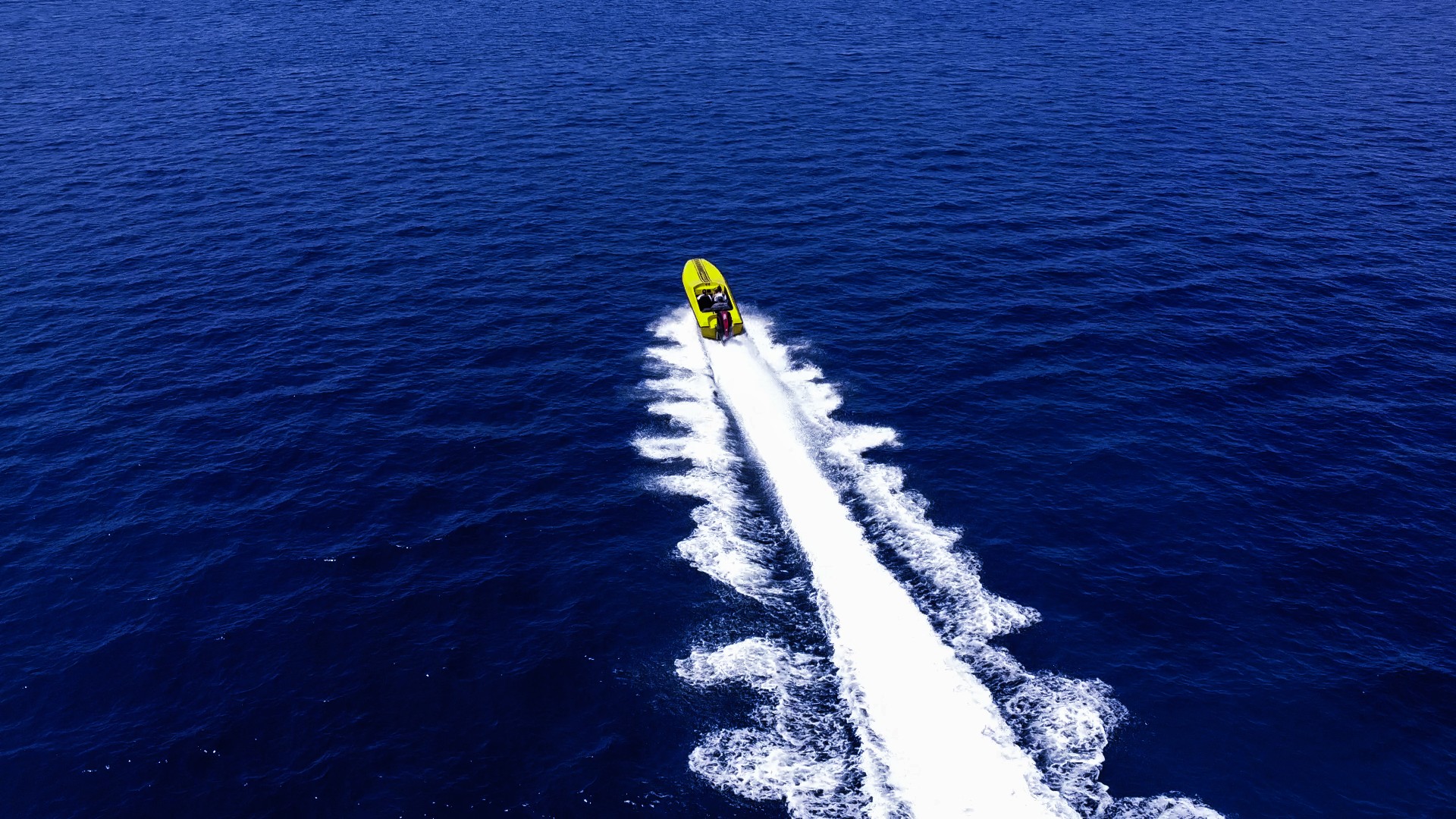 Yellow Speedboat — Open Sea